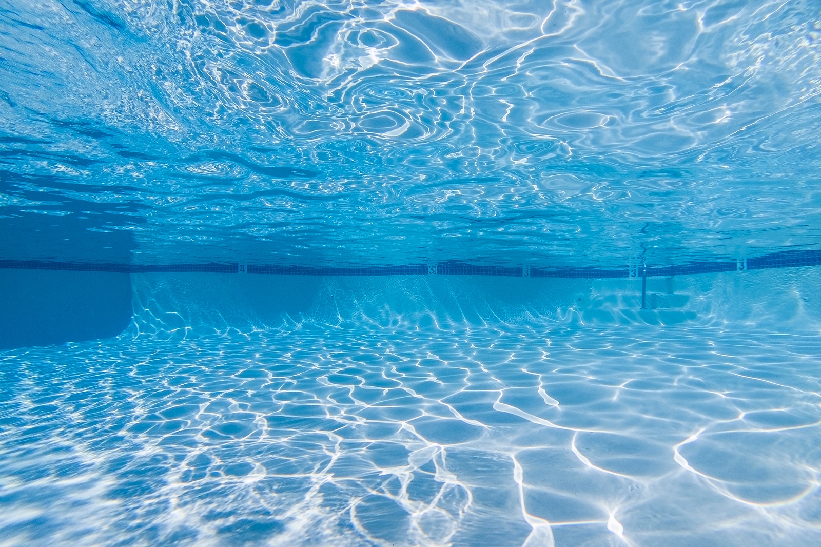 A pristine clean pool maintained by Deep End Pool Services
